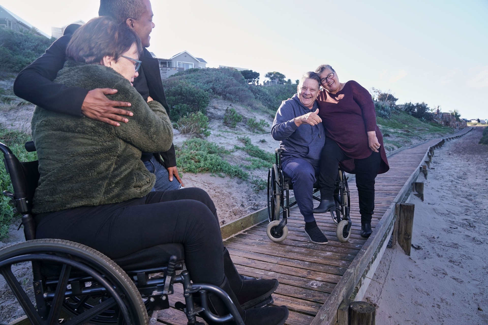 Disabled friends relaxing in landscape