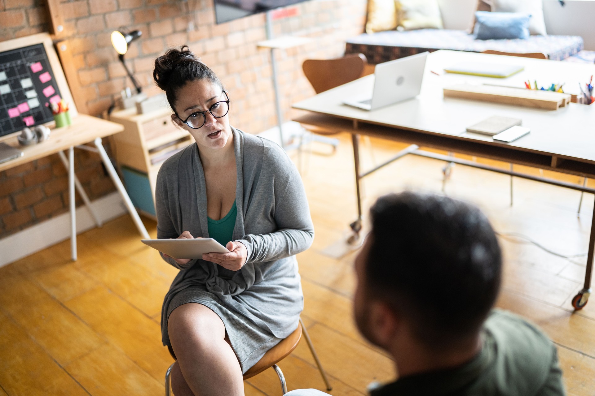 Mature psychologist or coach on a meeting